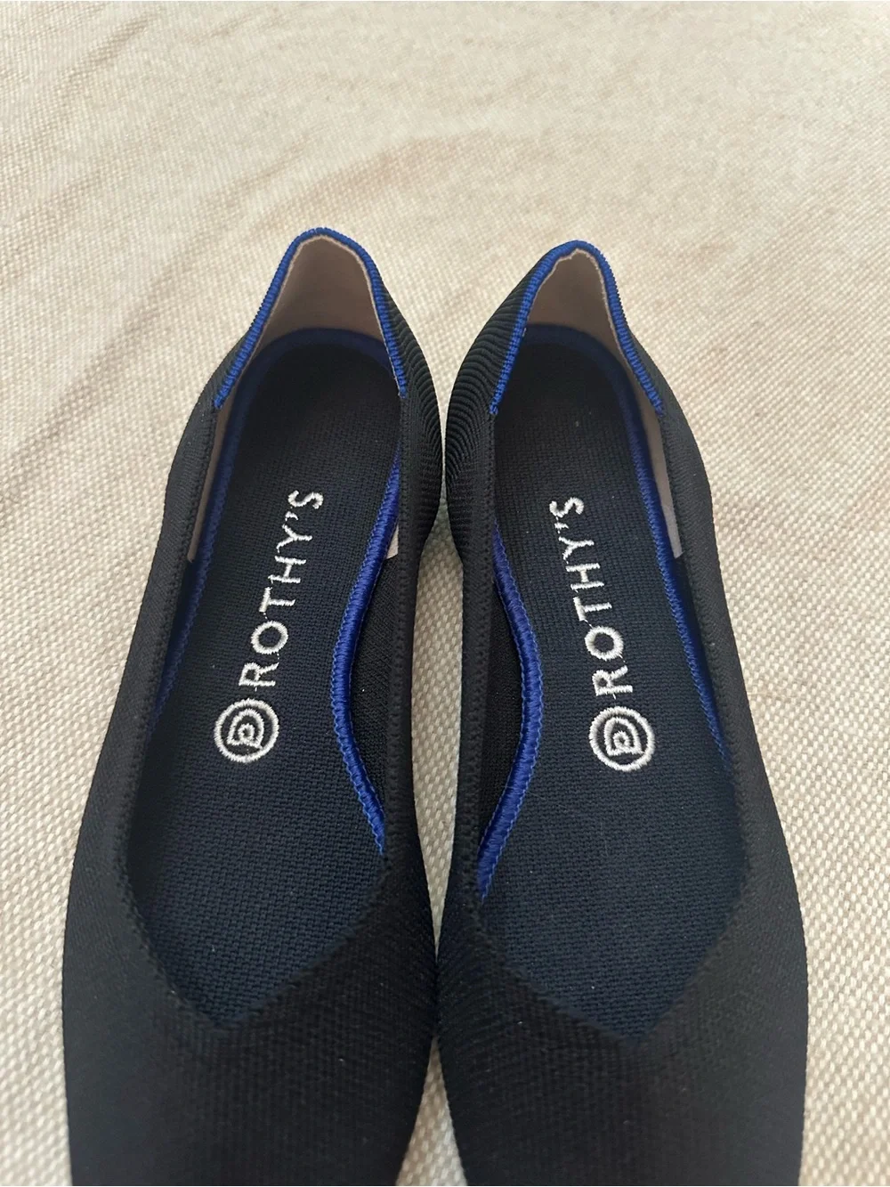 Rothy's Black Pointed Knit Flats with Blue Heel Trim